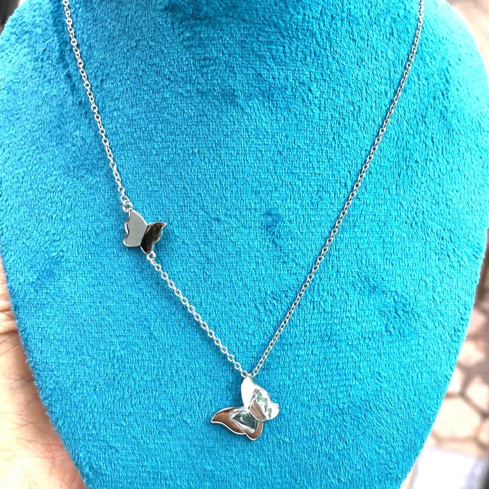 طقم الفراشة الفضي