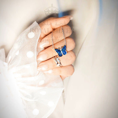 طقم الفراشة الزرقاء